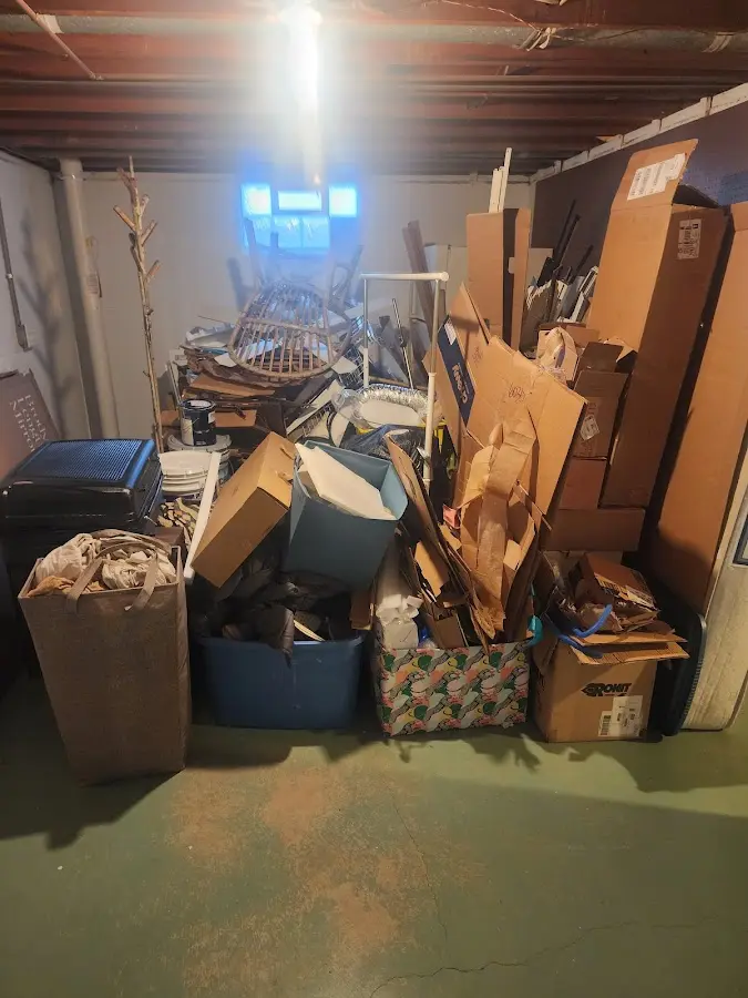 Roll-off dumpster container at job site for Yard Waste Dumpster Rental in Willis